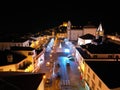 Beautiful night view of Castelo de vide with white buildings narrow streets illuminated by lamps