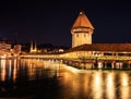 Beautiful Night view of Chapel Bridge and Water Tower with reflection on the lake, Lucerne, Switzerland, Europe Royalty Free Stock Photo