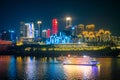 Beautiful night view of a colorful cruise ship traveling on River