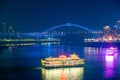 Beautiful night view of a colorful cruise ship traveling on River