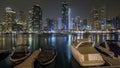 View of Dubai Marina Towers and yahct in Dubai at night timelapse hyperlapse Royalty Free Stock Photo