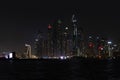 Beautiful night view of Dubai skyscrapers from the sea. skyline of Dubai Marina after sunset with a sea in the Royalty Free Stock Photo