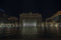 Beautiful night view of fountains of Bellagio casino hotel on Strip road.