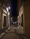 Beautiful night view of narrow alley in the historic center of Avignon, Provence, France with street lamp and historic buildings. Royalty Free Stock Photo