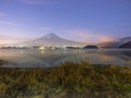 beautiful night view before sunrise from mountain fuji at kawaguchiko lake japan with soft focus foreground Royalty Free Stock Photo