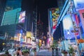 Beautiful night view of Time Square on Broadway with walking people Royalty Free Stock Photo