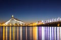 Beautiful night view to Latvian national library and stone bridge over Daugava river in Riga Latvia. Night, Xmas