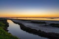 Nightfall with a colorful sky over wetlands and canals nature landscape Royalty Free Stock Photo