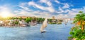 Beautiful Nile scenery of the sailboats and traditional villages of Aswan city, Egypt