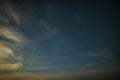 Beautiful noctilucent cloud formations in night sky with Milky Way in the background