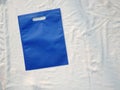 Beautiful non woven eco friendly blue D-Cut bag on white