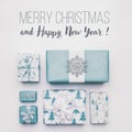 Beautiful nordic christmas gifts isolated on white background. Pastel blue colored wrapped xmas boxes. Gift wrapping. Royalty Free Stock Photo