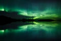 Beautiful northern lights over lake mirrored