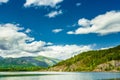 Beautiful Norwegian Nature Fjord. Summer Landscape With Mountain, Pure Water of Lake, Pond, River, Sea. Sunny Blue Sky. Royalty Free Stock Photo