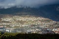 Beautiful norwegian nature. View of Bergen. Sunny day. City on the mountain. Cloudy cityscape