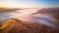 Beautiful November sunrise over mountain foggy valley Royalty Free Stock Photo