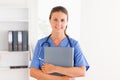 Beautiful nurse holding a folder Royalty Free Stock Photo