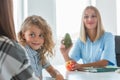 Nurse holds apple and avocado, healthy diet plan concept