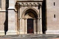 Beautiful oak wood church door or gate with black forged steel decorative pattern Royalty Free Stock Photo