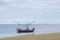 Beautiful ocean beach an fishing boat Royalty Free Stock Photo