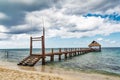 Beautiful ocean dock at a tropical island destination Royalty Free Stock Photo