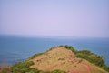 Beautiful ocean view from the top of a clip of a hill in goa
