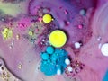 Beautiful oil colors of the universe. Bright colored bubbles sparkling. Abstract Acrylic Liquid Painting Texture. Macro Background