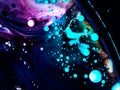 Beautiful oil colors of the universe. Bright colored bubbles sparkling. Abstract Acrylic Liquid Painting Texture. Macro Background