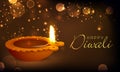 Beautiful oil lit lamp for Happy Diwali celebration. Royalty Free Stock Photo