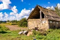 Beautiful old abandoned building farm house in countryside on natural background Royalty Free Stock Photo