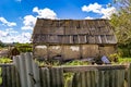 Beautiful old abandoned building farm house in countryside on natural background Royalty Free Stock Photo