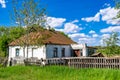 Beautiful old abandoned building farm house in countryside on natural background Royalty Free Stock Photo