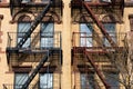 Beautiful Old Apartment Building Exterior with Fire Escapes in New York City Royalty Free Stock Photo