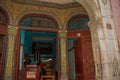 Beautiful old arched entrance to the building on the street in downtown Havana. Cuba Royalty Free Stock Photo