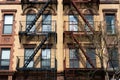 Beautiful Old Apartment Building Exterior with Fire Escapes in New York City Royalty Free Stock Photo