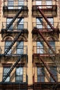 Beautiful Old Apartment Building Exterior with Fire Escapes in New York City Royalty Free Stock Photo