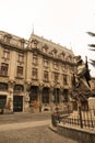 Beautiful Old building and a Statue in Bucharest Old Town Royalty Free Stock Photo