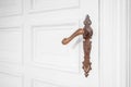 Beautiful old door handle - ornate metal door handle Royalty Free Stock Photo