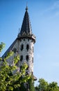 Beautiful old fairy-tale castle near Burgas, Bulgaria. Tower of the castle, green flower garden Royalty Free Stock Photo