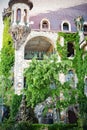 Beautiful old fairy-tale castle near Burgas, Bulgaria. Walls of the castle, green flower garden Royalty Free Stock Photo