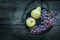 Beautiful, old-fashioned still life, apple, pear, blue grape Royalty Free Stock Photo