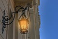 Beautiful old fashioned street lamp lighting on wall of building Royalty Free Stock Photo