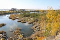 Beautiful old granite quarry with clear water in Indian summer. Royalty Free Stock Photo