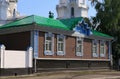 Beautiful old house in Russian style near the Orthodox Church in the Siberian city of Biysk in the Altai