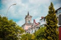 Beautiful old house with a spire in the city Royalty Free Stock Photo