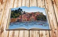 Beautiful old Lerici town in Liguria region Italy - 3D render concept image of an opened photo book isolated on white - I`m the