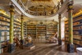 Beautiful old library with over 17000 books. The biggest handwritten book of the world - Codex Gigas DevilÃ¢â¬â¢s Bible was placed he Royalty Free Stock Photo