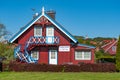 Beautiful old Lithuanian traditional wooden red house Royalty Free Stock Photo