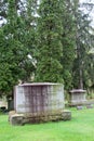 Peaceful scene of large trees surrounding old, weathered gravestone of soldier, Saratoga Monument and Victory Woods Cemetery, 2019