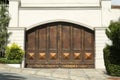 Beautiful old metal gate and white wall outdoors Royalty Free Stock Photo